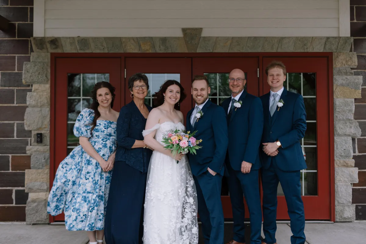 The Hamilton family, founders of Church Posting, standing together at their church